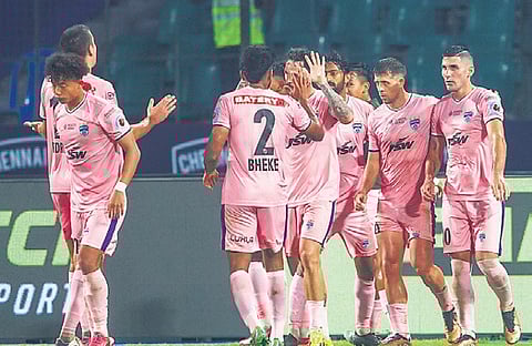 Bengaluru FC players celebrate a goal against Chennaiyin FC on Saturday