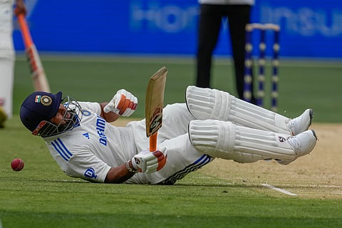 India's Rishabh Pant reacts after being hit by a ball during play on the third day of the fourth cricket test between Australia and India at the Melbourne Cricket Ground, Melbourne, Australia, Saturday, Dec. 28, 2024.