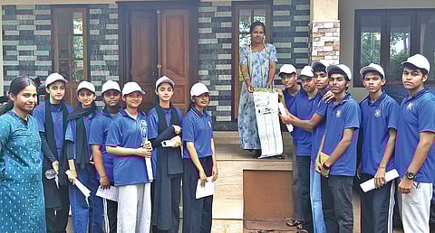 NSS volunteers of KPRGS Government VHSS Kalliassery, Kannur, during a house visit explaining the safe use and disposal of antibiotics.