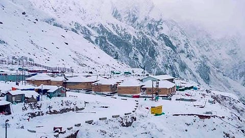 Houses in Kedarnath shrine area after fresh snowfall in Rudraprayag district of Uttarakhand on Saturday.