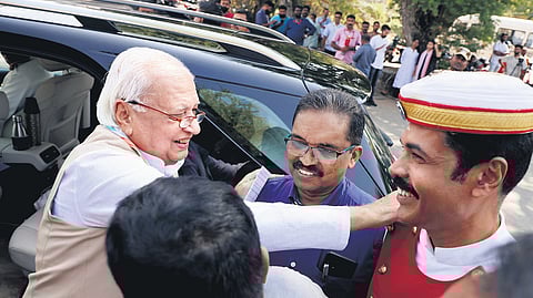 Arif Mohammed Khan shares a light moment with Raj Bhavan staff at the Thiruvananthapuram airport on Sunday before taking off to Patna to assume charge as Bihar governor.