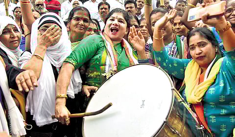Mahila Congress activists celebrate the victory of Congress candidates in eight of the 17 Lok Sabha seats in the state, at the Gandhi Bhavan in Hyderabad
