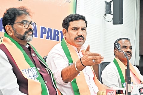 BJP state president BY Vijayendra (centre) addresses the media in Bengaluru on Monday