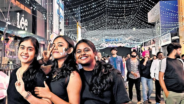 Youngsters in a celebratory mood at Brigade Road on Tuesday