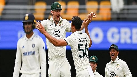 Mitchell Marsh and Mitchell Starc celebrating.