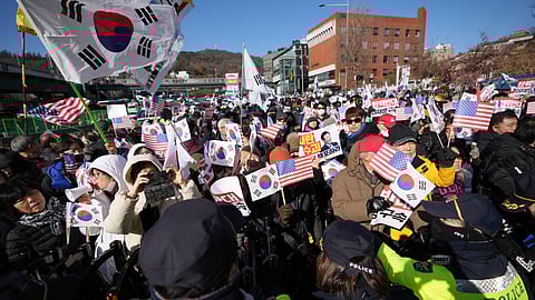 Supporters of impeached South Korean President Yoon Suk Yeol stage a rally near the presidential residence in Seoul, South Korea.