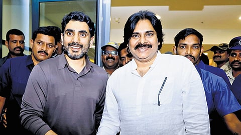 Deputy Chief Minister Pawan Kalyan and HRD Minister Nara Lokesh who ran into one another at Gannavaram Airport, exchange New Year greetings