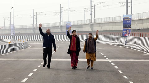 Delhi Chief Minister Atishi with MLA Shiv Charan Goel and UT Assembly Dy Speaker Rakhi Birla during the inauguration of the Punjabi Bagh flyover, in New Delhi on Thursday.