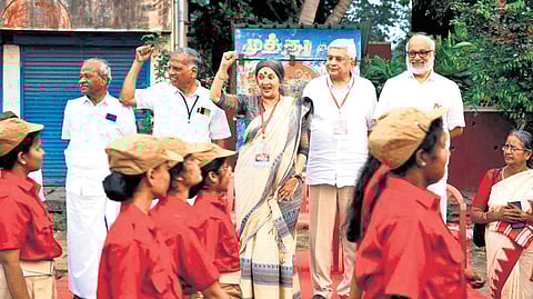 CPM leaders accepting the guard of honour of the Red Army