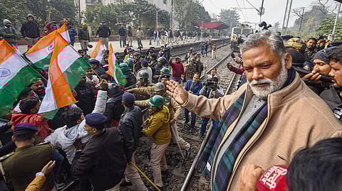 MP Pappu Yadav joins the protest of students demanding the cancellation of the 70th Integrated Combined Competitive Exam, 2024, over allegations of question paper leak, at Sachiwalay Halt railway station, in Patna.