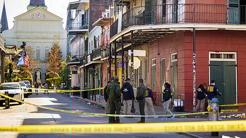 The FBI investigates the area on Orleans Street and Bourbon Street by St. Louis Cathedral in the French Quarter where a suspicious package was detonated after a person drove a truck into a crowd earlier on Bourbon Street on Wednesday, Jan. 1, 2025.