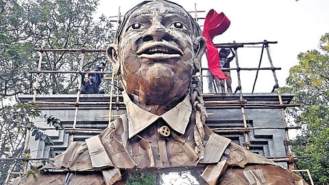 Premises of Karnataka Chitrakala Parishat being spruced up for Chitra Santhe on Friday. The fair is held on first Sunday of January every year