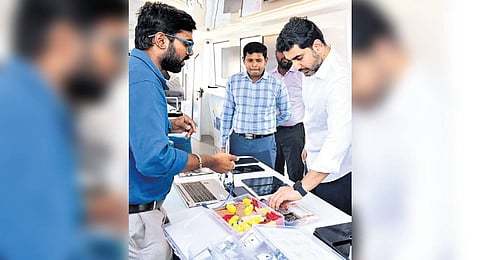 Minister Lokesh examines prototype of AP-Maker-Lab-On-Wheels.
