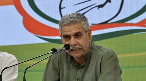 Congress leader and the party candidate for the New Delhi constituency Sandeep Dikshit addresses a press conference at AICC headquarters in New Delhi.