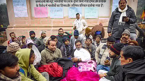 Jan Suraaj chief Prashant Kishor with others during his indefinite hunger strike demanding the cancellation of the 70th Integrated Combined Competitive Examination (CCE) in Patna.