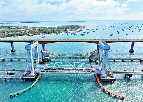 An official from the Southern railway explained that 310 MT of steel ingots serve as counterweights on either side of the bridge, with high-tension cables connecting them to the span.