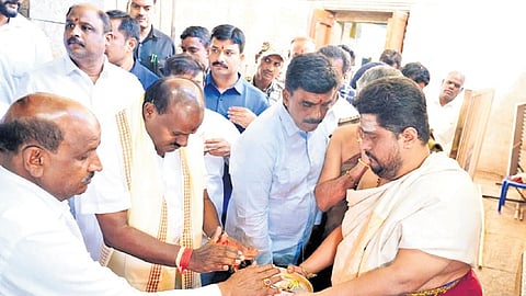 Union Minister HD Kumaraswamy offers puja at Sri Chamundeshwari Temple atop Chamundi Hills in Mysuru on Sunday.