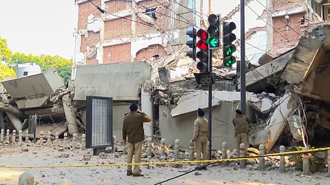 Police personnel at the spot after a multi-storey building collapsed, in Chandigarh.
