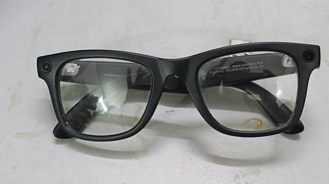 Cameras attached to spectacles.