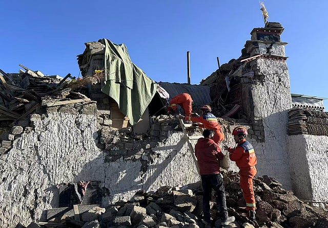 In this photo released by Xinhua News Agency, rescue workers search for survivors in the aftermath of an earthquake in Changsuo Township of Dingri in Xigaze, southwestern China's Tibet Autonomous Region on Tuesday, Jan. 7, 2025.