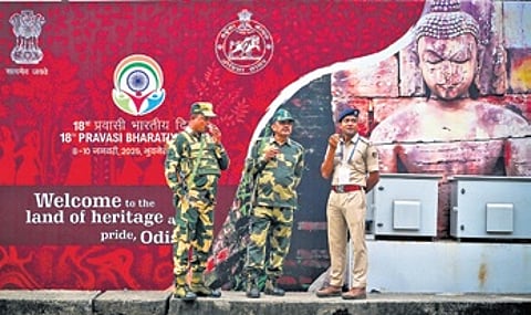 Security personnel stand guard near Janata Maidan, the venue for 18th Pravasi Bharatiya Divas in Bhubaneswar