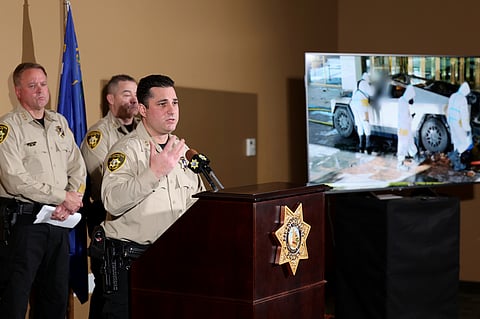 Metropolitan Police Department Assistant Sheriff Dori Koren shows a photo of the investigation into a Tesla Cybertruck that exploded at the Trump International Hotel, during a news conference at Metropolitan Police Department headquarters in Las Vegas, Tuesday, Jan. 7, 2025