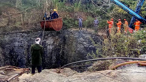 Efforts underway to rescue the labourers trapped inside a coal mine, in Dima Hasao district, Assam.