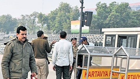 Security personnel inspect the Kartavya Path ahead of the Republic Day parade in New Delhi on Thursday.