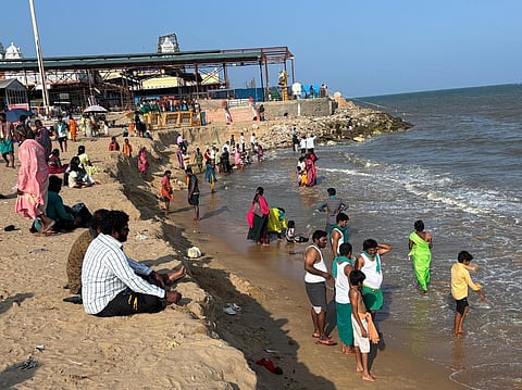 The devotees take baths at the Tiruchendur temple beach where soil erosion occurs