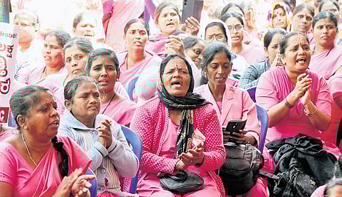 ASHA workers protest demanding fixed monthly honorarium of Rs 15,000 and other benefits at Freedom Park on Thursday