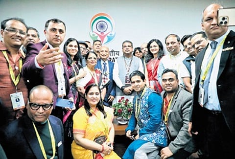 Union minister Dharmendra Pradhan poses for a group photograph at the PBD event