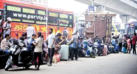 Public waiting at Koyambedu to board buses to their hometown on Friday