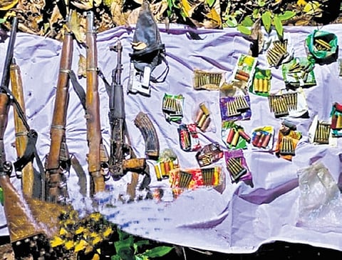 Arms and ammunition that were recovered from a forest near Kittaleguli village in Chikkamagaluru district
