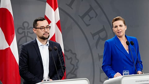 Danish Prime Minister Mette Frederiksen and her Greenland's counterpart Mute B. Egede, left, meet the media in the Mirror Hall at the Prime Minister's Office, at Christiansborg in Copenhagen.
