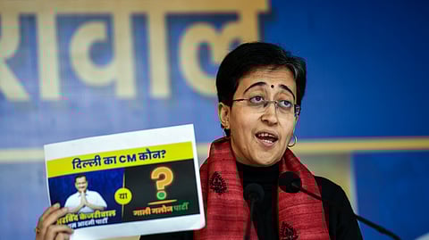 Delhi Chief Minister Atishi addresses a press conference ahead of state assembly Elections, in New Delhi on Friday.
