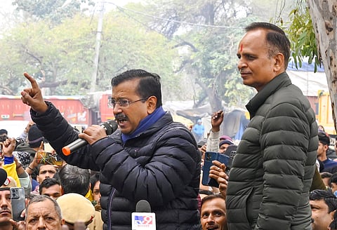 Former Delhi CM and AAP national convener Arvind Kejriwal with party leader Satyendar Jain addresses the media, at Shakur Basti area, in New Delhi, Sunday, Jan. 12, 2025.