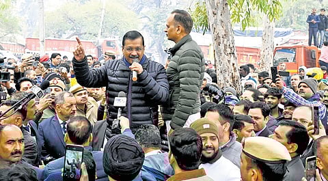 AAP chief Arvind Kejriwal interacts with people at Shakur Basti
