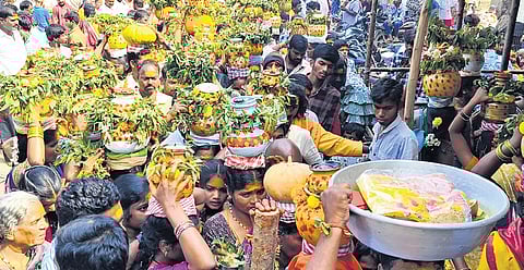 Devotees at the Sri Mallikarjuna Swamy temple in Inavolu village of Wardhannapet mandal in Hanamkonda district on Monday