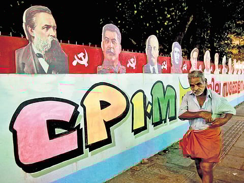 Graffiti announcing the CPM district conference in Kaloor