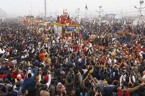 FILE- Prayagraj: Jagadguru Rambhadracharya during a procession of Shri Digambar Ani Akhara towards the Sangam to take the first 'Amrit Snan' at the Mahakumbh
