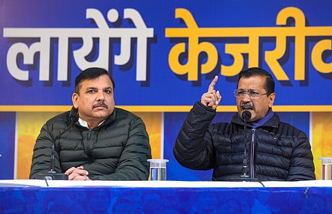AAP national convenor Arvind Kejriwal and party leader Sanjay Singh addressing a press conference in Delhi.