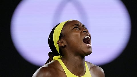 Coco Gauff of the US reacts after winning a point against Jodie Burrage of Britain during their second round match at the Australian Open tennis championship in Melbourne, Australia, Wednesday, Jan 15, 2025.