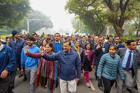 Aam Aadmi Party (AAP) National Convener Arvind Kejriwal on his way to file nomination for the upcoming Delhi Assembly elections, in New Delhi.