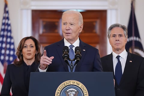 President Joe Biden, center, with Vice President Kamala Harris, left, and Sec. of State Anthony Blinken, right, speaks in the Cross Hall of the White House on the announcement of a ceasefire deal in Gaza and the release of dozens of hostages after more than 15 months of war, Wednesday, Jan. 15, 2025, in Washington.