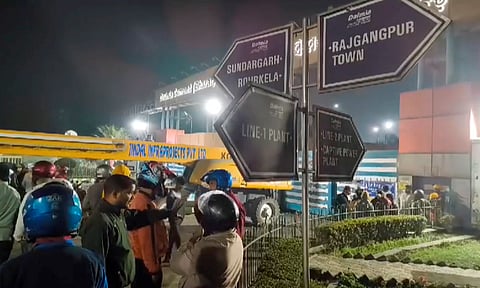 People gather outside the Dalmia Cement factory after an incident of hopper collapse, at Rajgangpur, in Sundargarh district, Odisha.