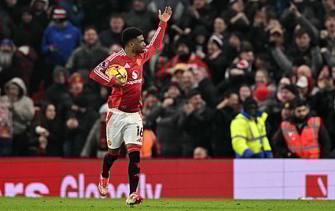 Manchester United's Ivorian midfielder #16 Amad Diallo celebrates after scoring the equalising goal during the English Premier League football match between Manchester United and Southampton at Old Trafford in Manchester, north west England, on January 16, 2025.