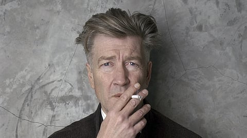 Filmmaker David Lynch poses at his Los Angeles home March 14, 2002.