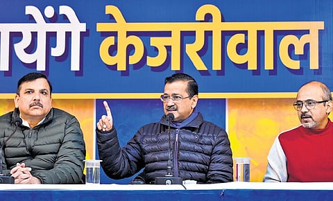 AAP chief Arvind Kejriwal with party leaders Sanjay Singh and Dilip Pandey.