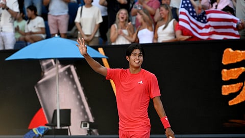 USA's Learner Tien celebrates victory against France's Corentin Moutet during their men's singles match on day seven of the Australian Open tennis tournament in Melbourne on January 18, 2025.