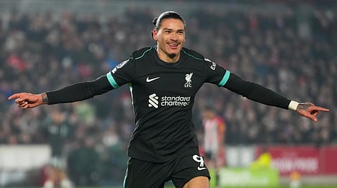 Liverpool's Darwin Nunez celebrates after scoring his side's second goal during the English Premier League soccer match between Brentford and Liverpool.